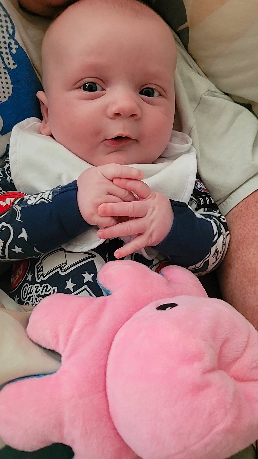 Charlie joined the competition — help win amazing prizes! arm, baby, baby_toddler_clothing, cheek, child, collar, comfort, gesture, happy, knee, nail, pattern, person, pink, sitting, skin, sleeve, stomach, thumb, toddler