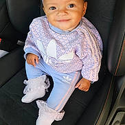 Ocean-Ray joined the competition — help win amazing prizes! baby, child, smile, headband, bow, curly_hair, adidas, socks, car_seat, clothing, pastel_colors, cute, portrait, sitting, young_child, fashion, happy, indoor, person, footwear