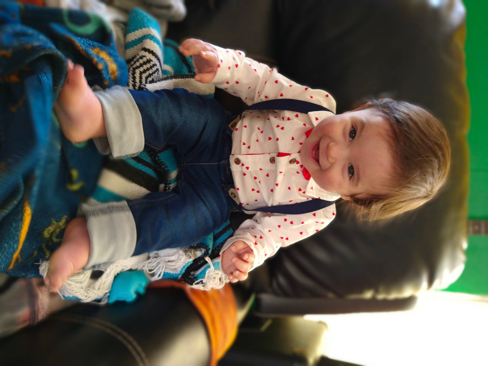 Anthony is registered to the contest to win money with this photo: baby, baby_products, baby_toddler_clothing, child, comfort, elbow, finger, fun, hand, happy, human_body, joy, lap, leg, leisure, people, person, recreation, sitting, smile