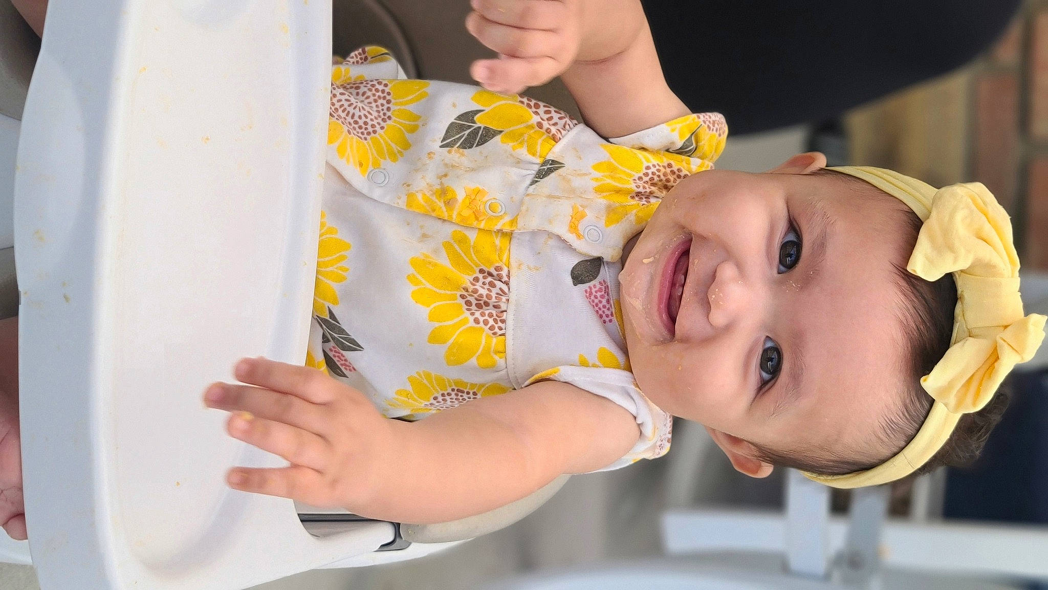 Monroe is registered to the contest to win money with this photo: arm, baby, baby_toddler_clothing, book, chair, cheek, child, ear, eyelash, finger, fun, hand, happy, nose, person, product, room, skin, smile, textile