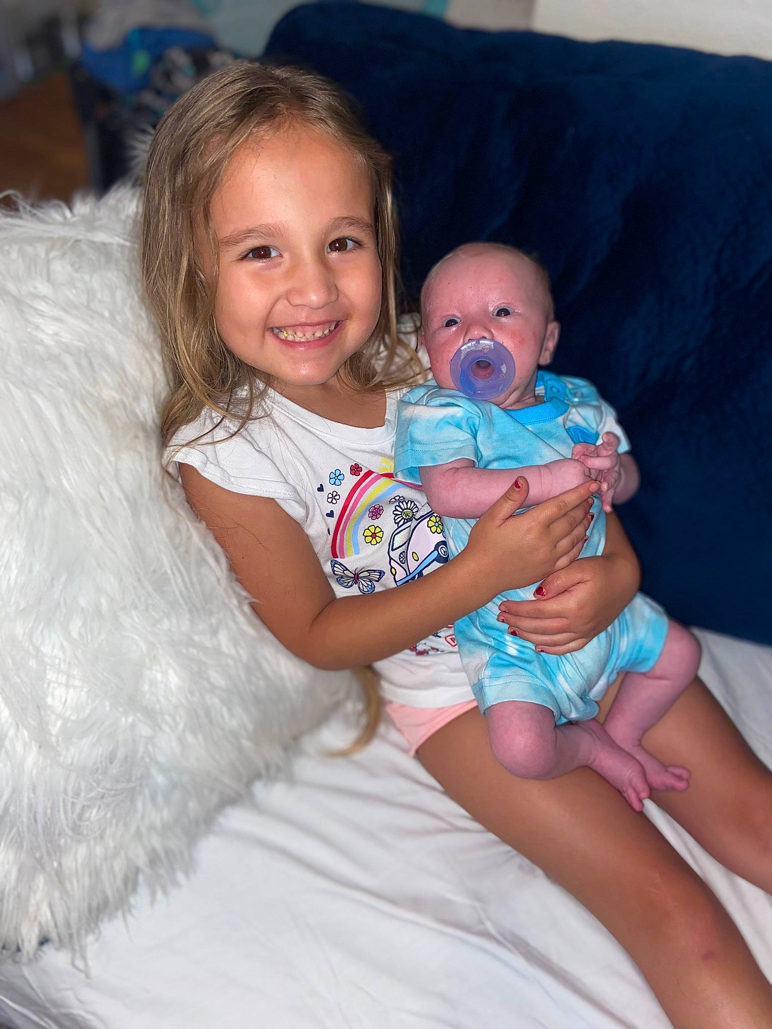 Legend joined the competition — help win amazing prizes! arm, baby_toddler_clothing, comfort, couch, eye, face, facial_expression, fashion, flash_photography, hairstyle, happy, head, iris, joy, organ, person, pink, skin, smile, standing