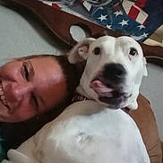 Mommas joined the competition — help win amazing prizes! animal, bed, bedroom, blanket, close_up, cuddling, dog, face, happy, human, indoors, person, pet, portrait, relaxed, selfie, sleeping, tongue_out, white_dog, white_fur