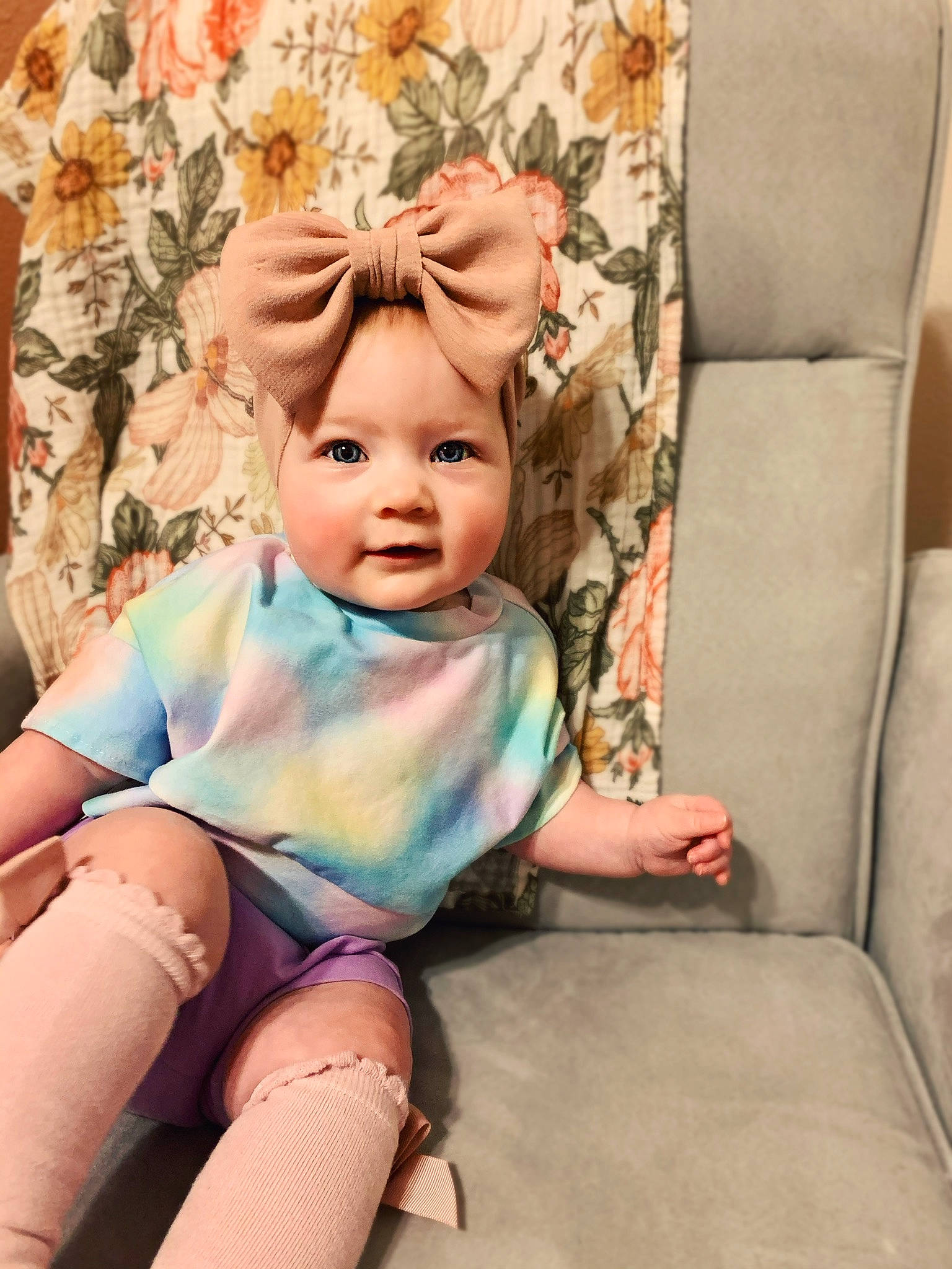 Addison is registered to the contest to win money with this photo: baby, child, child_model, fawn, headwear, leg, person, sitting, toddler