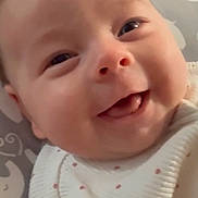 Harper joined the competition — help win amazing prizes! baby, infant, child, smiling, happy, portrait, face, close_up, indoors, play_mat, baby_clothing, white_outfit, polka_dots, lying_down, eyes, mouth, teeth, home, cozy, photography