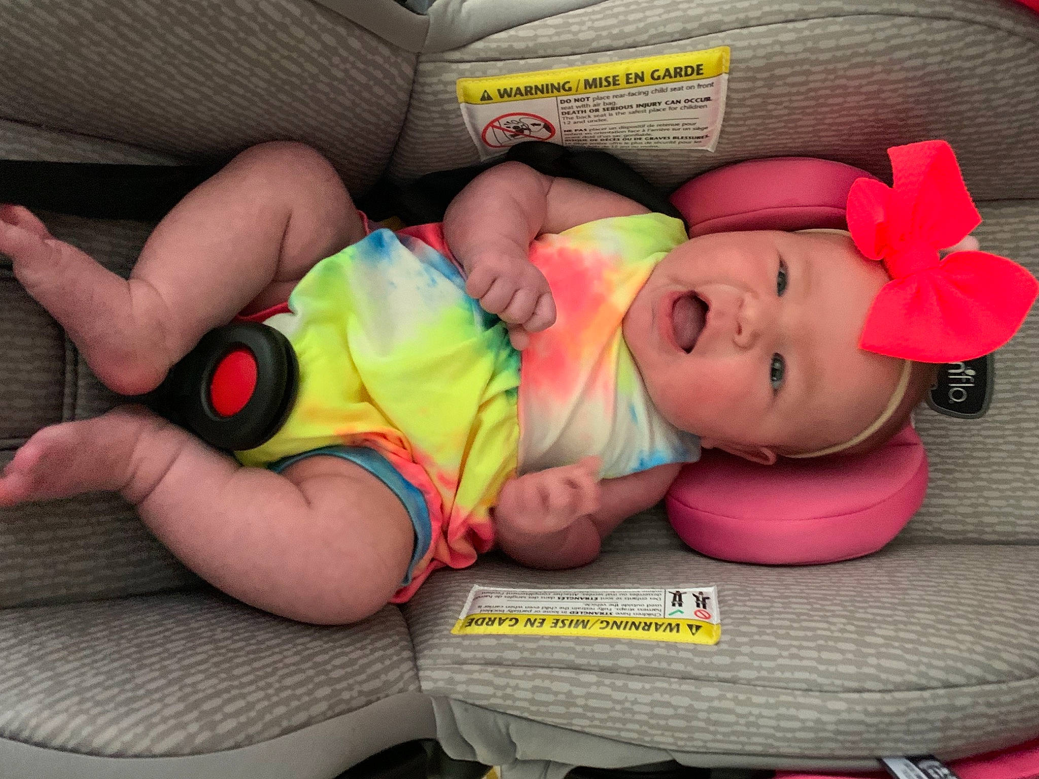 Evelyn Rose joined the competition — help win amazing prizes! baby, baby_products, baby_sleeping, baby_toddler_clothing, child, comfort, finger, fun, happy, hat, headwear, human_body, human_leg, knee, lap, leg, nail, orange, person, sitting