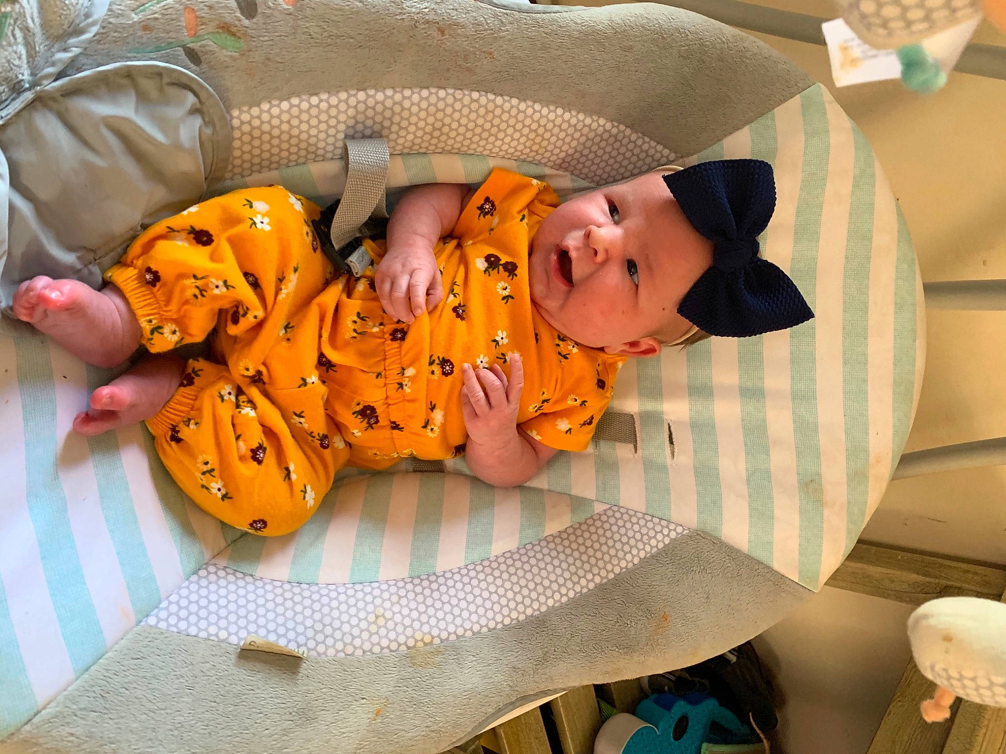 Evelyn Rose joined the competition — help win amazing prizes! baby, baby_products, baby_toddler_clothing, chair, child, comfort, event, fun, hat, headwear, linens, orange, pattern, person, room, scarf, sitting, textile, toddler