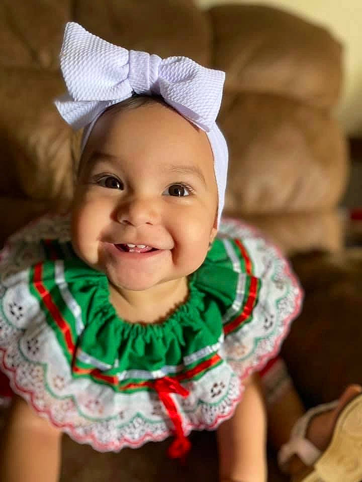 Giana joined the competition — help win amazing prizes! baby, baby_toddler_clothing, cap, cheek, chin, christmas, costume_hat, dress, event, eye, face, happy, head, holiday, human_body, joy, person, skin, sleeve, smile