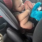 Peyton joined the competition — help win amazing prizes! baby, blond_hair, blue_toy, car_interior, car_seat, casual, child, child_safety, comfort, curious, cute, foot, hand, indoor, infant, plush_toy, seat, seatbelt, skin, young_child