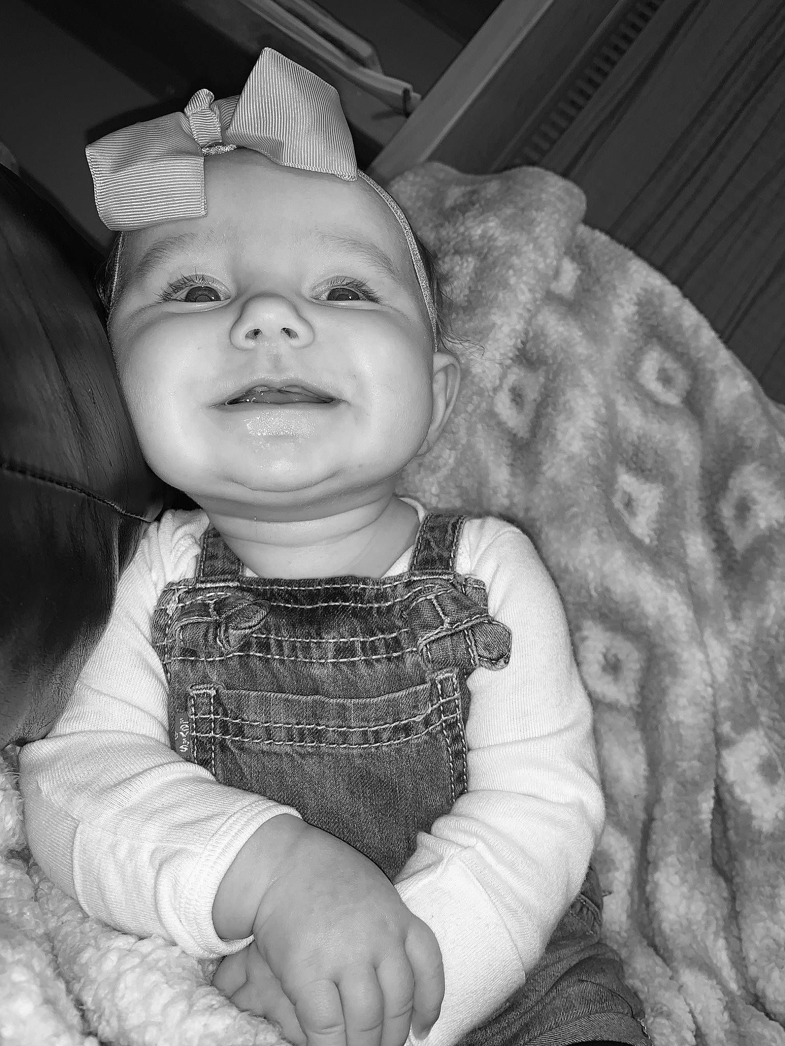 Gracelynn joined the competition — help win amazing prizes! arm, black, cheek, chin, eye, eyebrow, flash_photography, hairstyle, hand, head, headwear, human_body, iris, lip, mouth, nose, person, skin, sleeve, smile