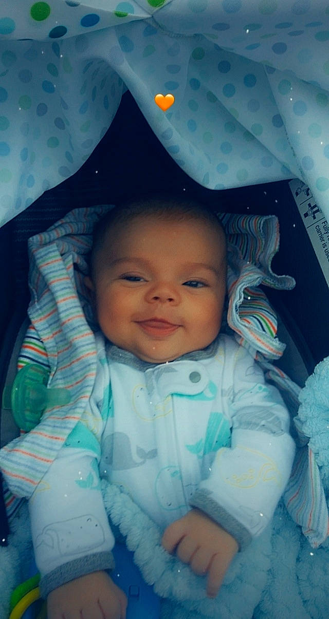 Bentlee is registered to the contest to win money with this photo: baby, blue, cheek, child, eye, face, forehead, fun, head, iris, nose, person, skin, smile, snapshot, space, toddler