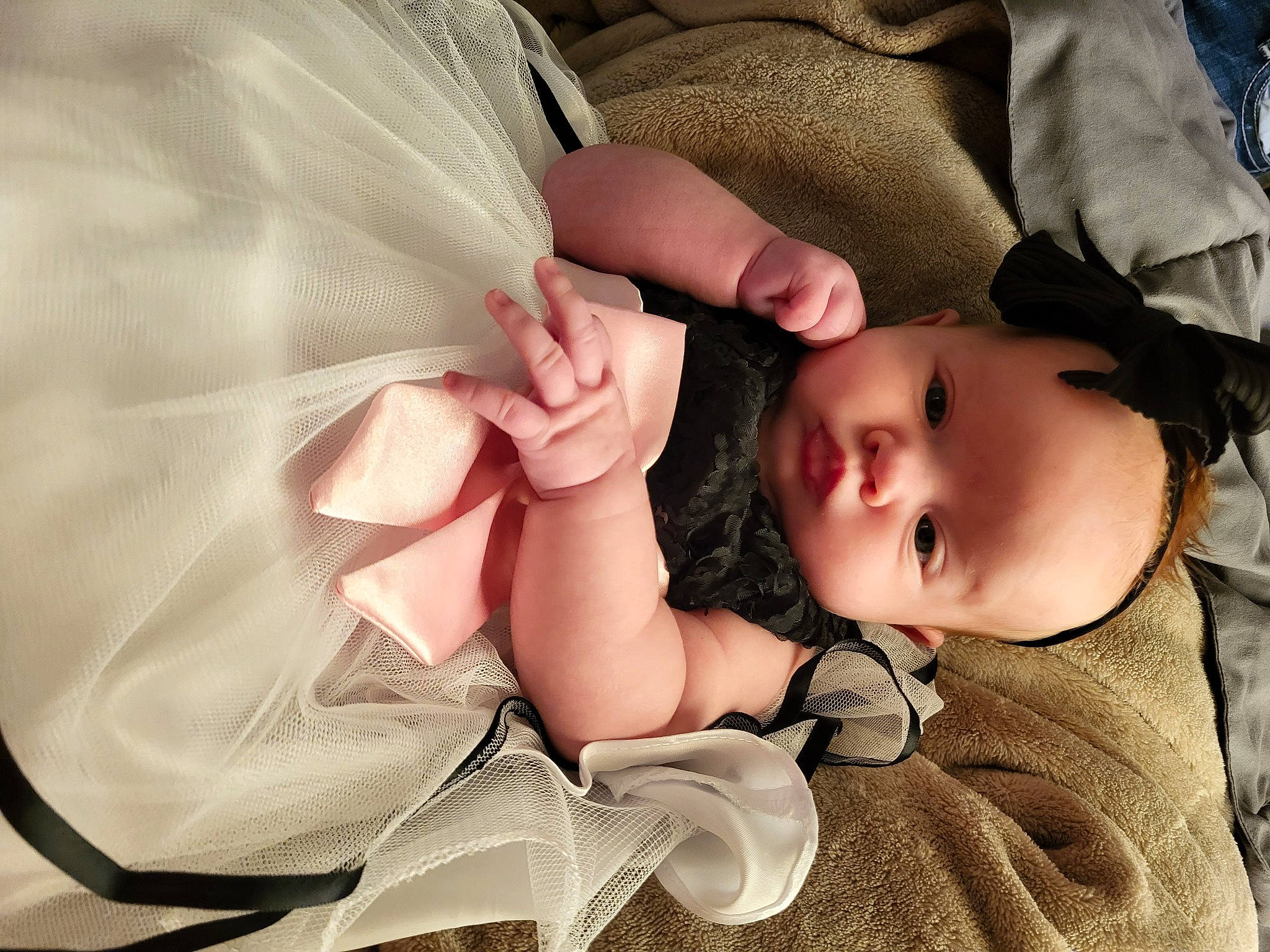 Amara joined the competition — help win amazing prizes! arm, baby, baby_toddler_clothing, cheek, comfort, eye, eyelash, finger, gesture, hand, head, headgear, human_body, lip, nail, nose, person, skin, sleeve, toddler