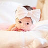baby, infant, headband, bow, blanket, soft, cute, face, portrait, child, sleepwear, indoors, resting, newborn, closeup, expression, skin, tinyhands, cozy, pink