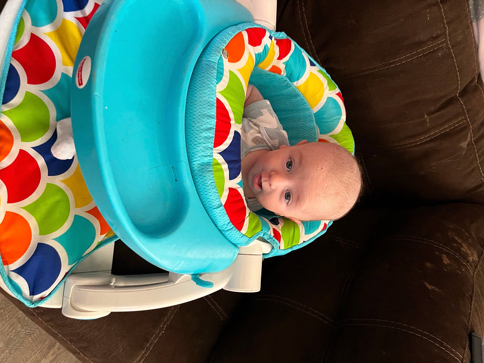 Liam is registered to the contest to win money with this photo: baby, baby_playing_with_toys, baby_products, baby_toddler_clothing, balloon, cap, child, circle, comfort, fun, happy, hat, leisure, party_supply, person, personal_protective_equipment, play, recreation, room, toddler