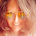 Tina W.