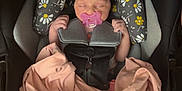 Ava-Grace Miles joined the competition — help win amazing prizes! baby, black, blanket, car_seat, child, comfort, cute, floral_pattern, headband, indoors, infant, newborn, pacifier, person, pink, resting, safety_harness, seat, sleeping, toddler