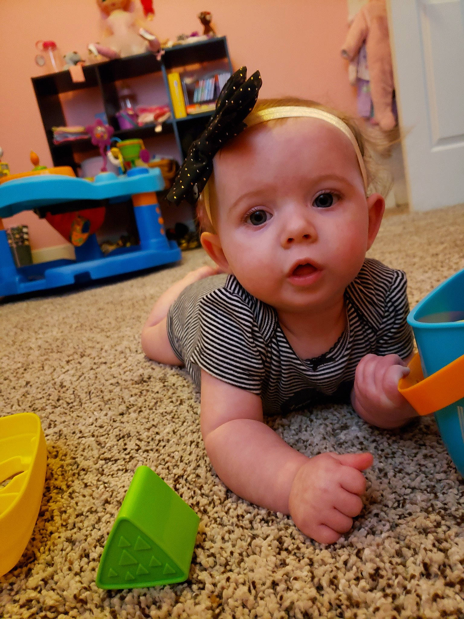 Aeris is registered to the contest to win money with this photo: baby, child, fun, head, person, play, room, smile, toddler