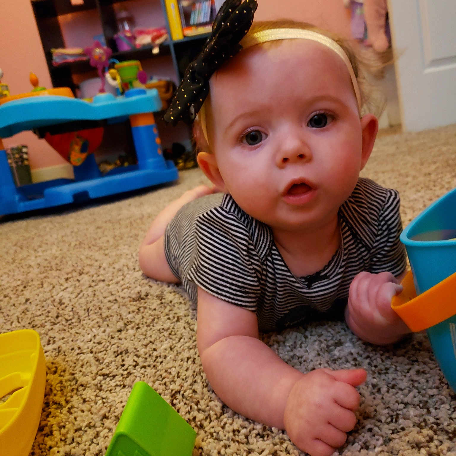 Aeris is registered to the contest to win money with this photo: baby, child, fun, head, person, play, room, smile, toddler