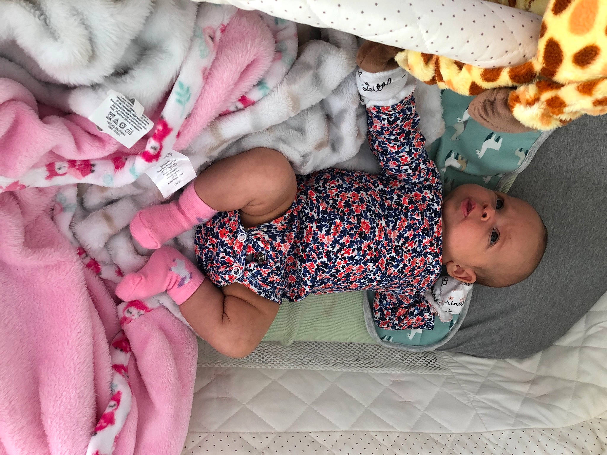 Braelyn joined the competition — help win amazing prizes! baby, baby_products, baby_sleeping, baby_toddler_clothing, carmine, child, comfort, linens, magenta, nail, nap, pattern, person, pink, product, room, sleeve, sock, textile, toddler