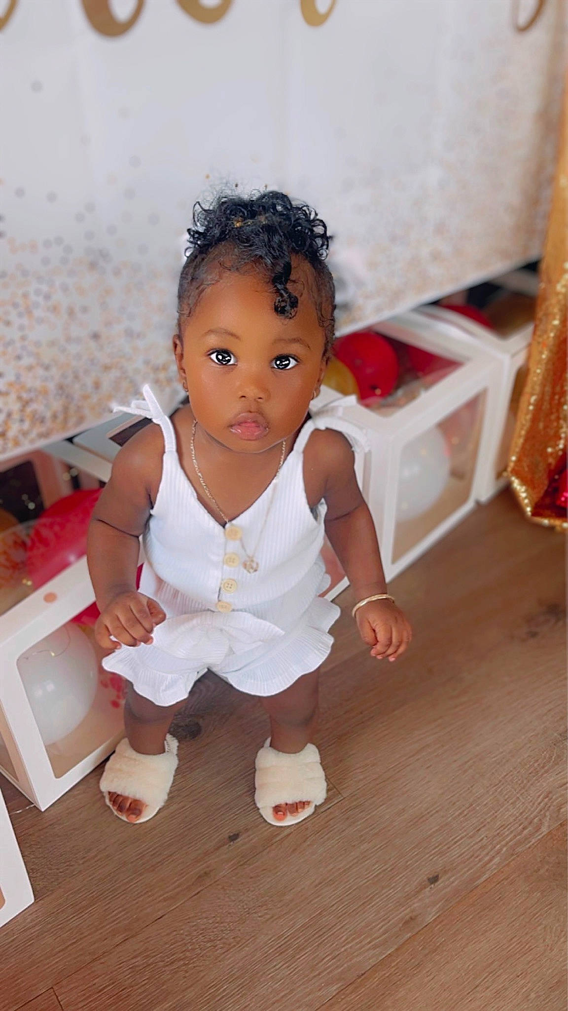 Ava joined the competition — help win amazing prizes! baby, baby_toddler_clothing, cheek, child, dress, flash_photography, floor, flooring, foot, happy, hardwood, head, human_leg, leg, person, pink, shipping_box, skin, sock, toddler