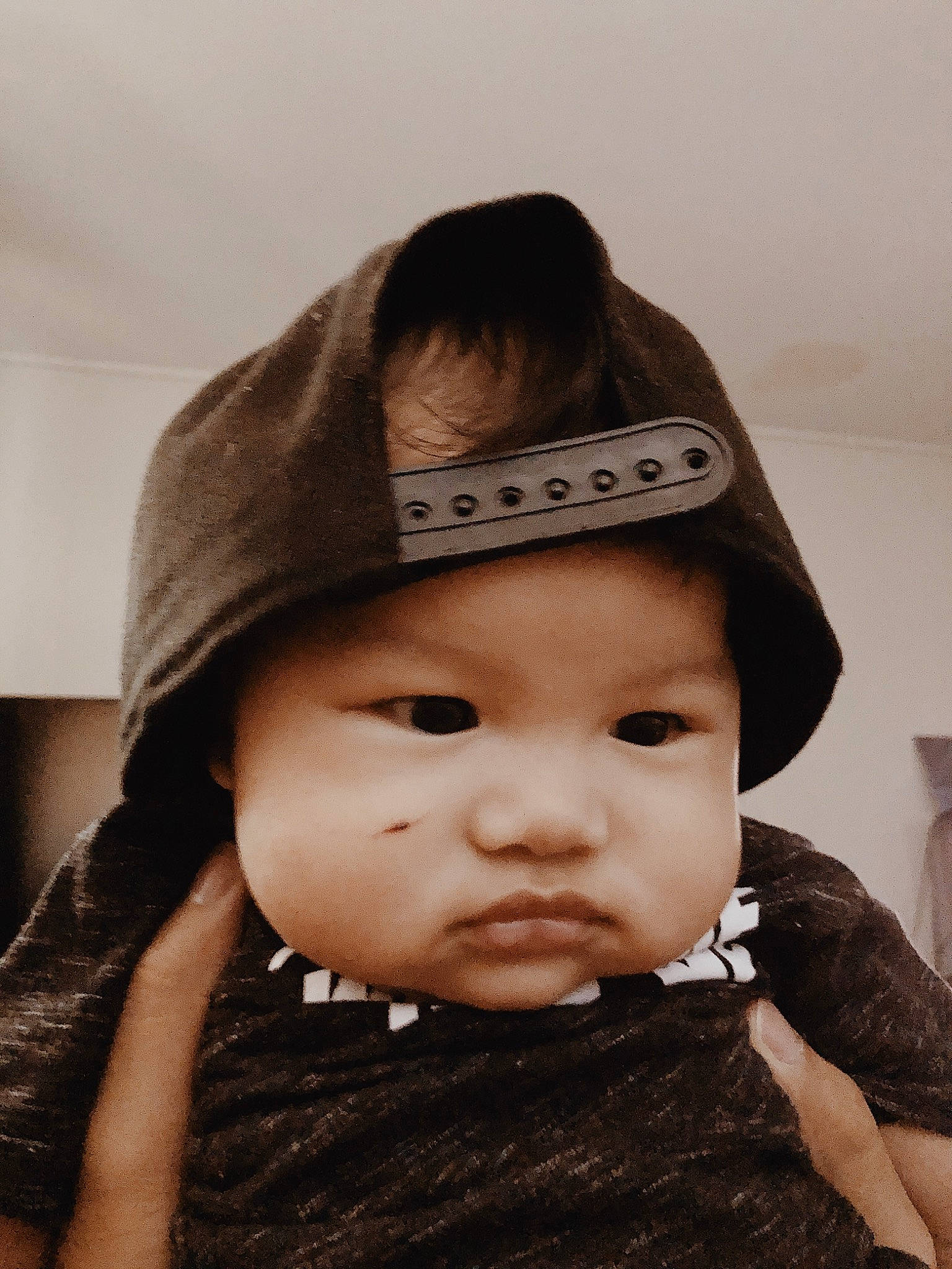 Jayven is registered to the contest to win money with this photo: black_hair, child, clothing, costume_accessory, fashion_accessory, hat, headgear, headwear, person, toddler