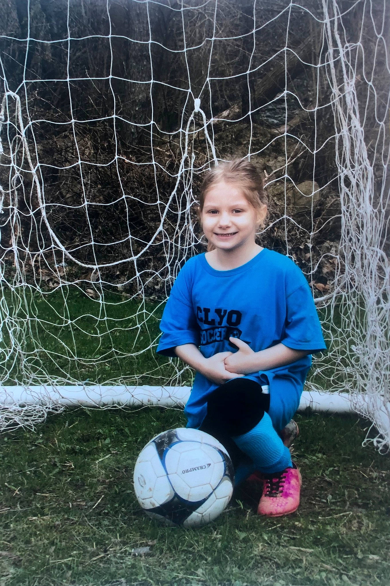 Ariann joined the competition — help win amazing prizes! ball, ball_game, football, grass, joy, leisure, mammal, mesh, nature, net, person, player, shorts, smile, soccer, soccer_ball, sports, sports_equipment, t_shirt, team_sport