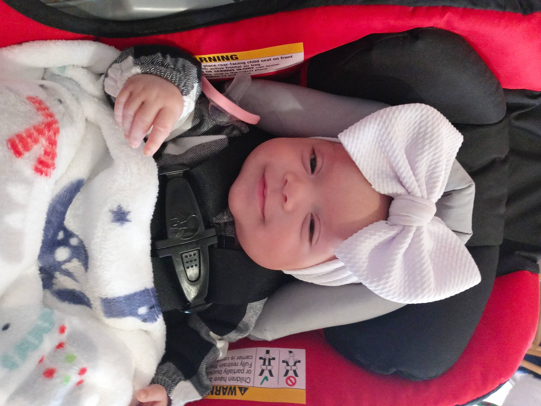 Khalessi joined the competition — help win amazing prizes! auto_part, baby, baby_carriage, baby_in_car_seat, baby_products, baby_safety, baby_sleeping, baby_toddler_clothing, car_seat, carmine, cheek, child, comfort, eyelash, headwear, lap, linens, pattern, person, product