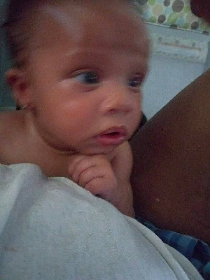 Selina is registered to the contest to win money with this photo: baby, cheek, chest, chin, comfort, ear, eyebrow, eyelash, finger, forehead, gesture, iris, lip, mouth, muscle, neck, nose, person, skin, thumb