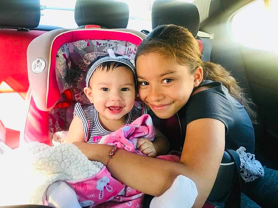 Ashlyn Aviles-vazquez is registered to the contest to win money with this photo: baby_in_car_seat, car, car_seat, child, ear, family_car, fun, happy, joy, person, pink, product, sibling, smile, toddler, vacation