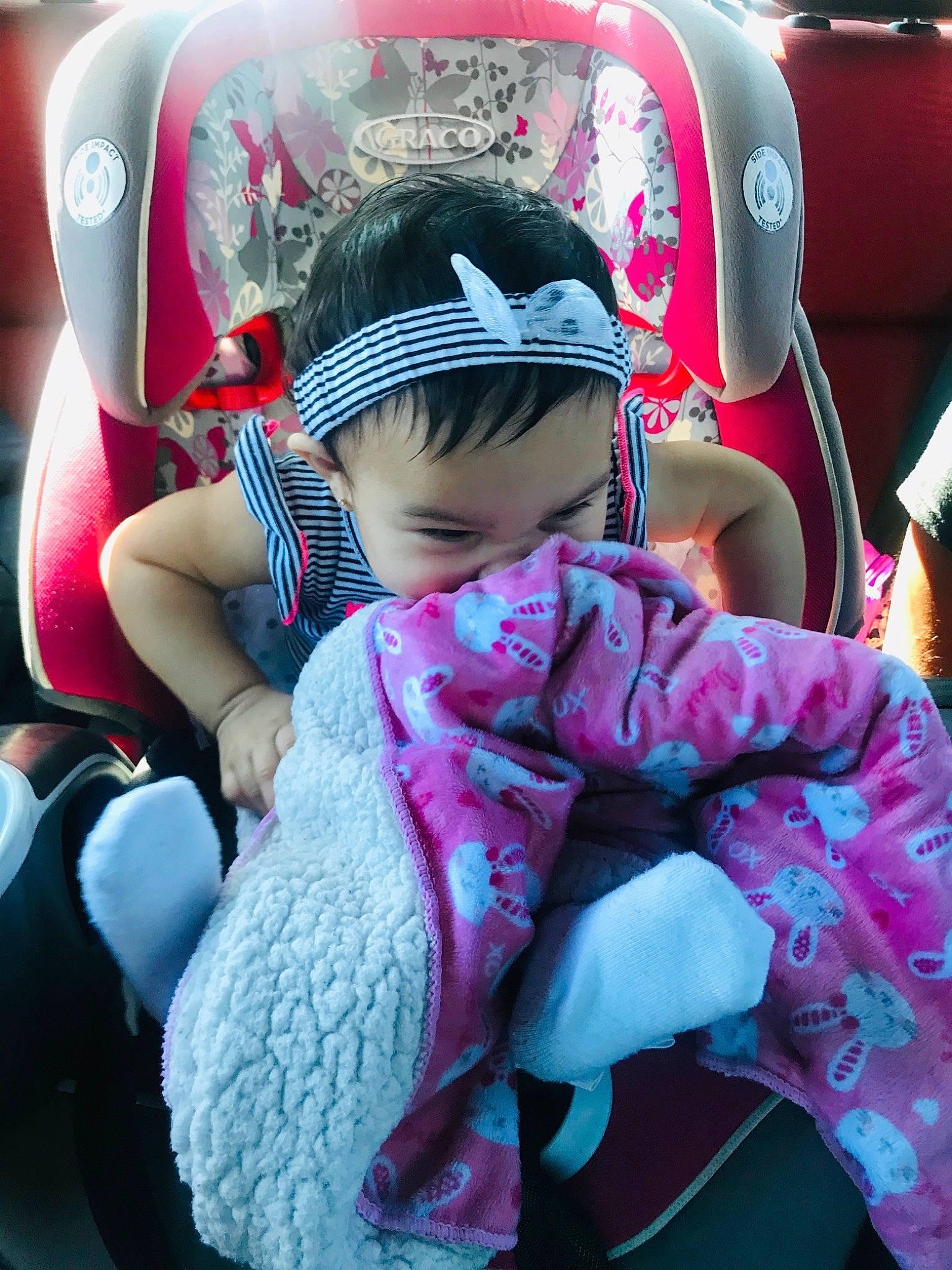 Anáis joined the competition — help win amazing prizes! auto_part, baby, baby_carriage, baby_products, car, car_seat, child, fun, headgear, magenta, person, personal_protective_equipment, pink, plant, skin, toddler, vacation, vehicle