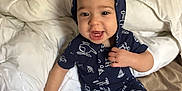 Westin is registered to the contest to win money with this photo: baby, babylaughing, bed, bedroom, blanket, clothing, cushion, face, furniture, happy, head, homedecor, indoors, laughing, pajamas, person, photography, portrait, room, smile
