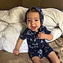 baby, babylaughing, bed, bedroom, blanket, clothing, cushion, face, furniture, happy, head, homedecor, indoors, laughing, pajamas, person, photography, portrait, room, smile