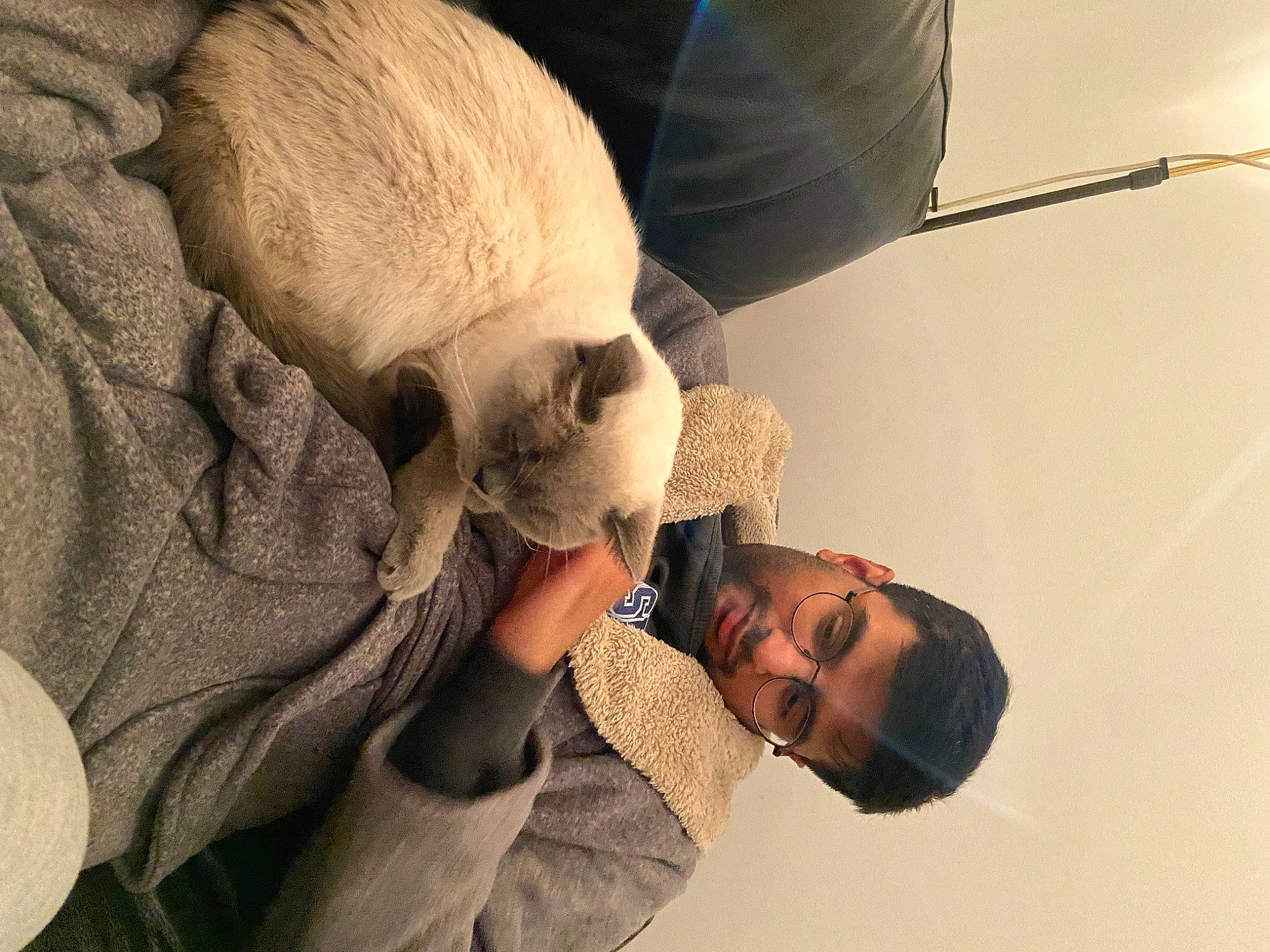 Forrest is registered to the contest to win money with this photo: art, audio_equipment, beard, bone, comfort, ear, elbow, eyewear, facial_hair, fur, gesture, happy, human_body, nap, visual_arts