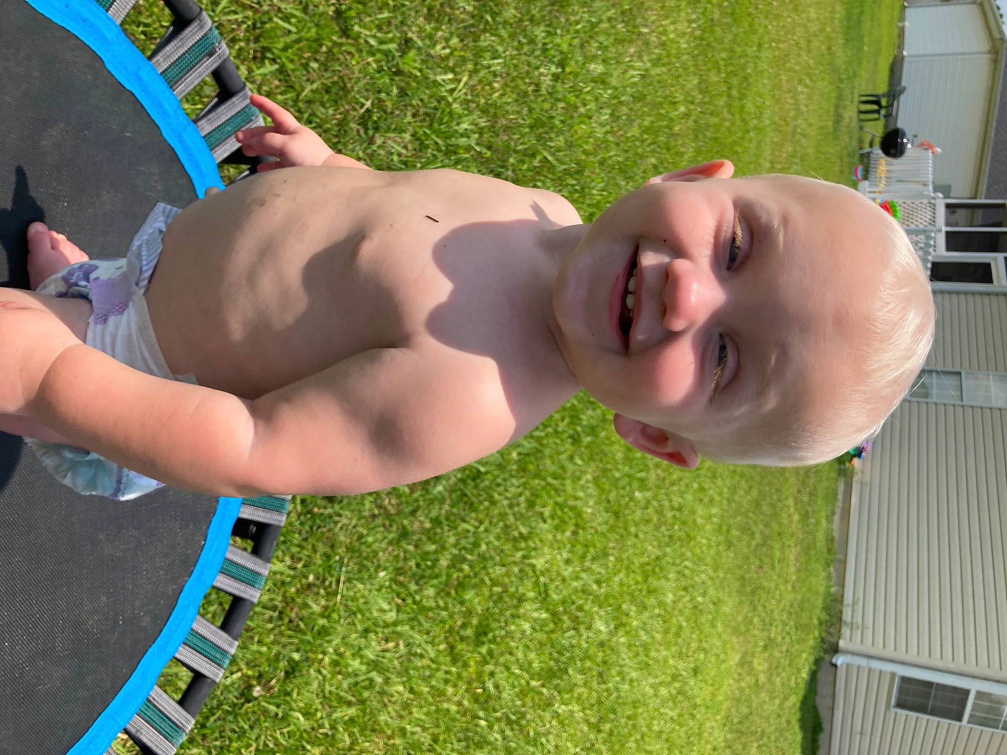 Brandon is registered to the contest to win money with this photo: abdomen, baby, barechested, chest, cool, elbow, finger, fun, grass, hairstyle, happy, human_body, joy, leisure, muscle, person, smile, summer, thigh, toddler