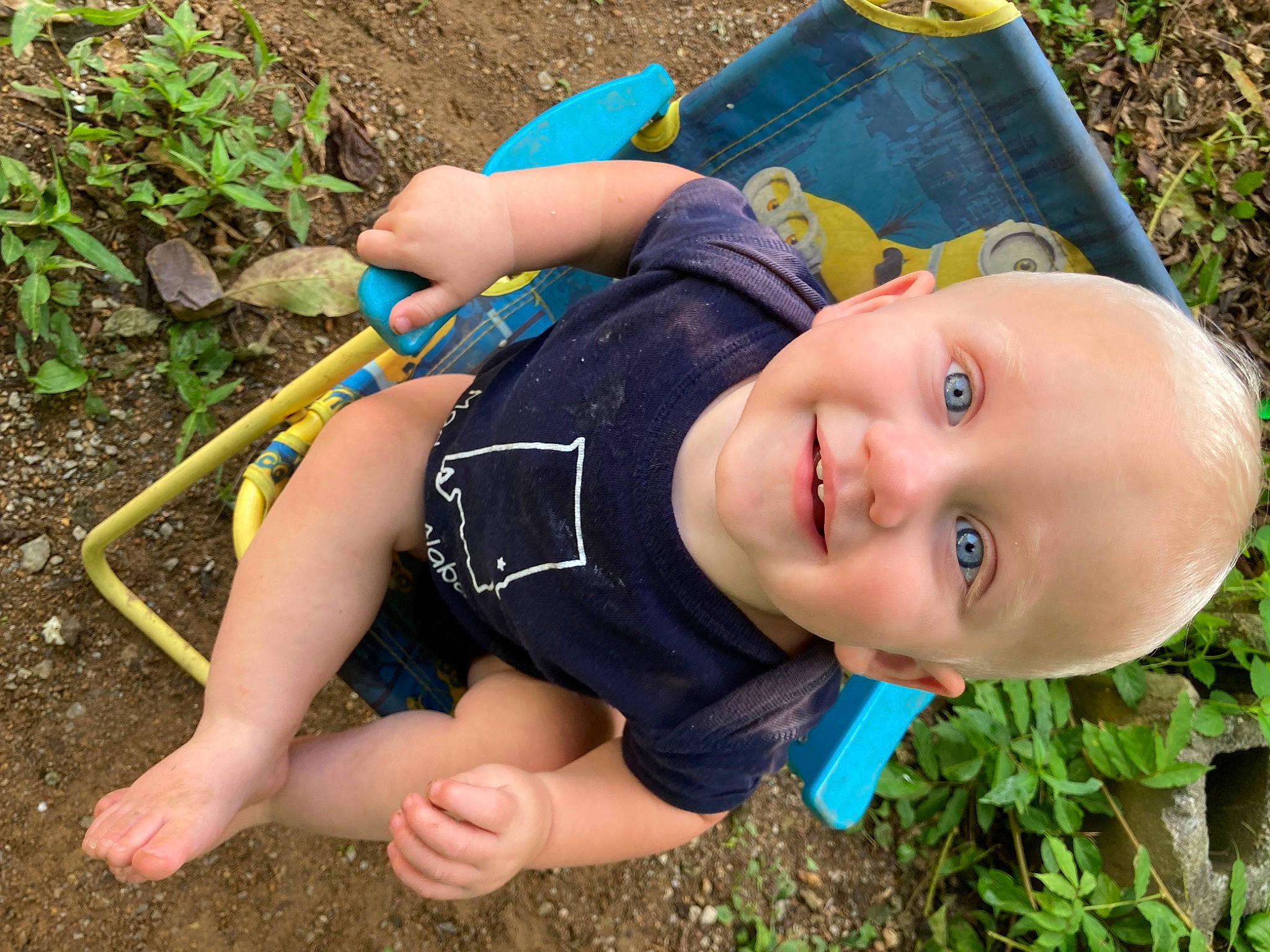 Brandon is registered to the contest to win money with this photo: beauty, blue, child, electric_blue, fun, grass, green, happy, joy, leaf, leisure, people_in_nature, person, plant, play, recreation, sitting, smile, soil, toddler