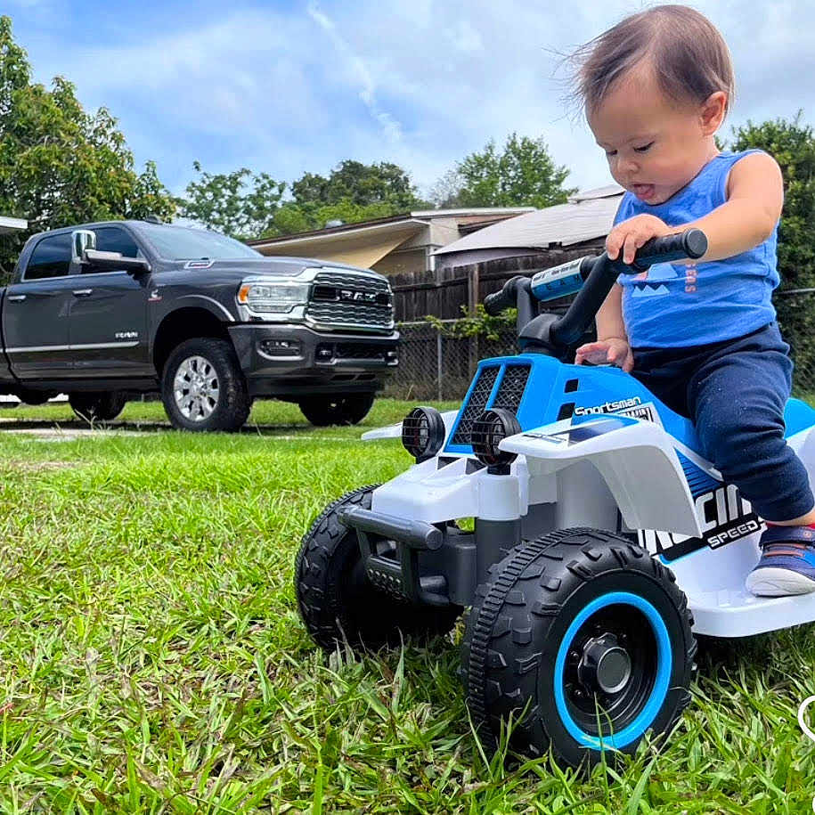 Nathan Alexander is registered to the contest to win money with this photo: baby, backyard, device, e_scooter, grass, lawn, lawnmower, maceclub, machine, mowinglawn, nature, person, plant, tire, tool, transportation, truck, vehicle, weapon, wheel