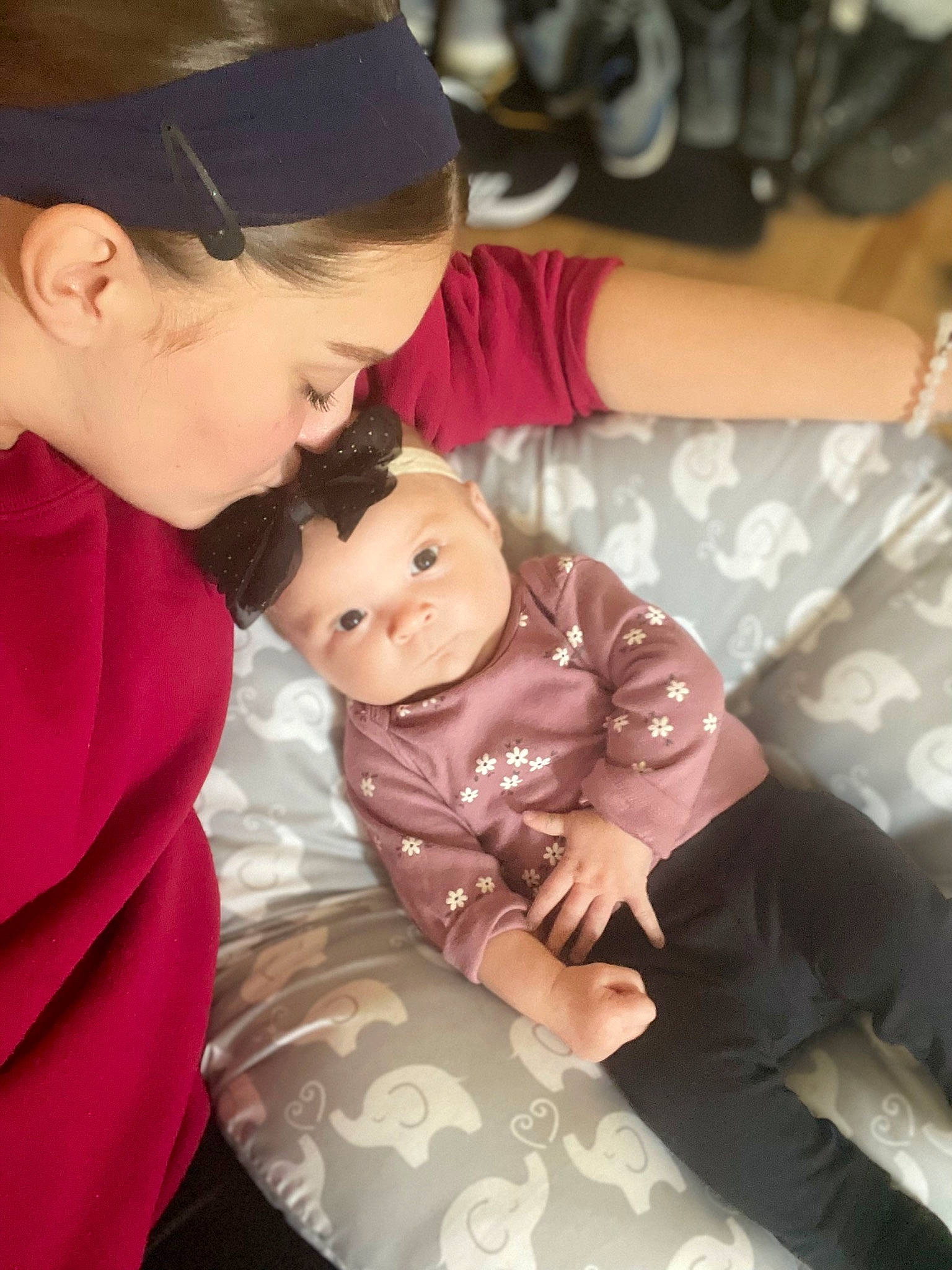 Isabella is registered to the contest to win money with this photo: baby, baby_toddler_clothing, baseball_cap, cap, cheek, child, comfort, event, finger, fun, gesture, happy, hat, lap, mammal, person, sitting, skin, toddler, tradition