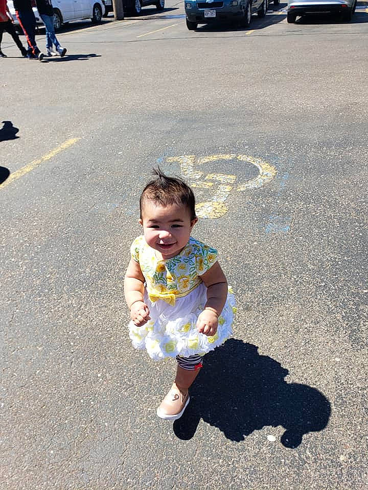 Penelope Andreas joined the competition — help win amazing prizes! asphalt, baby, car, child, fun, joy, leaf, people, person, play, shadow, sidewalk, smile, snapshot, toddler, tree, vacation, vehicle, walking