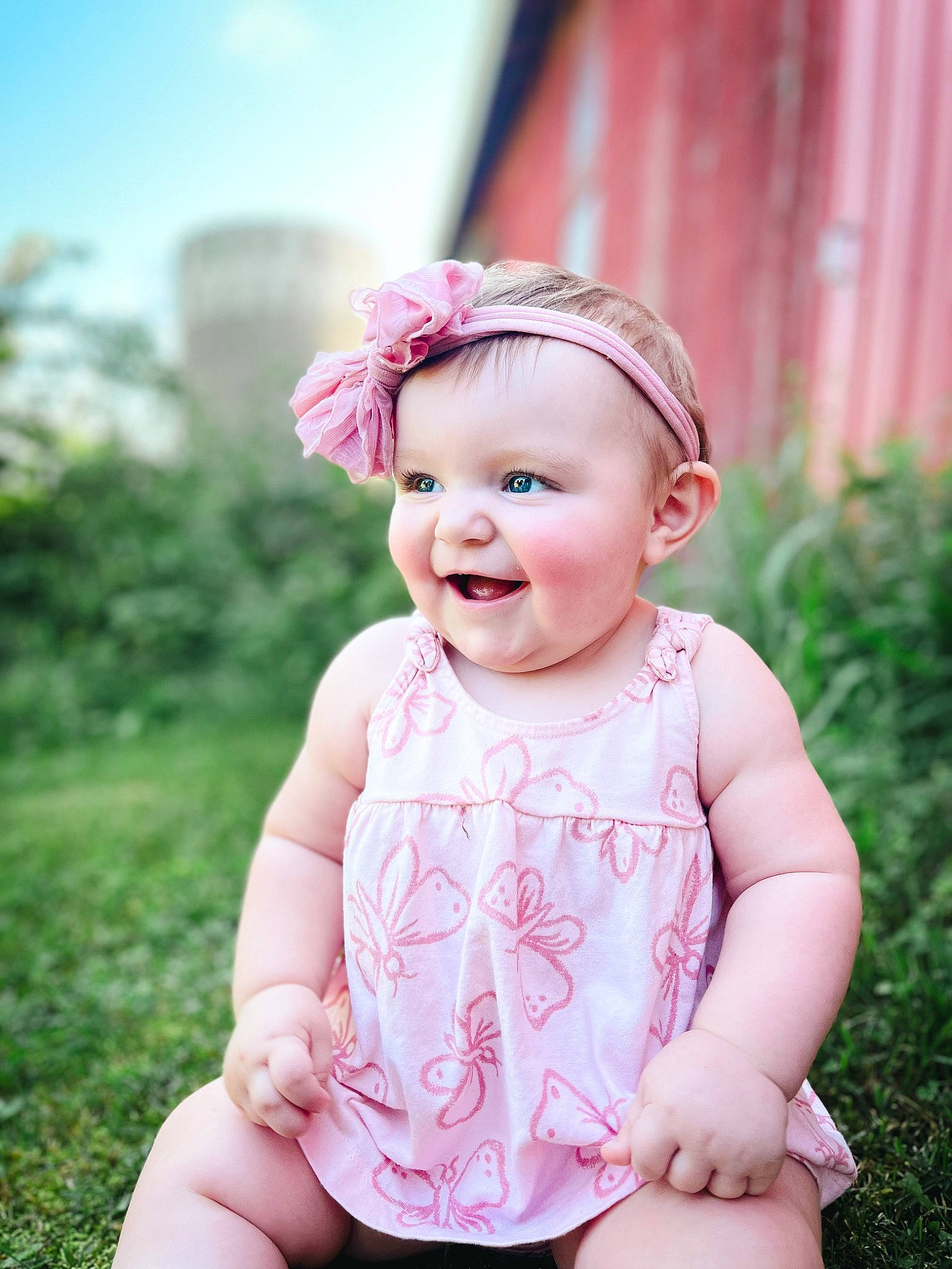 Ella Joy is registered to the contest to win money with this photo: baby, baby_toddler_clothing, child, fashion_accessory, flash_photography, fun, grass, happy, headband, joy, magenta, pattern, people_in_nature, person, pink, plant, sitting, skin, sky, smile