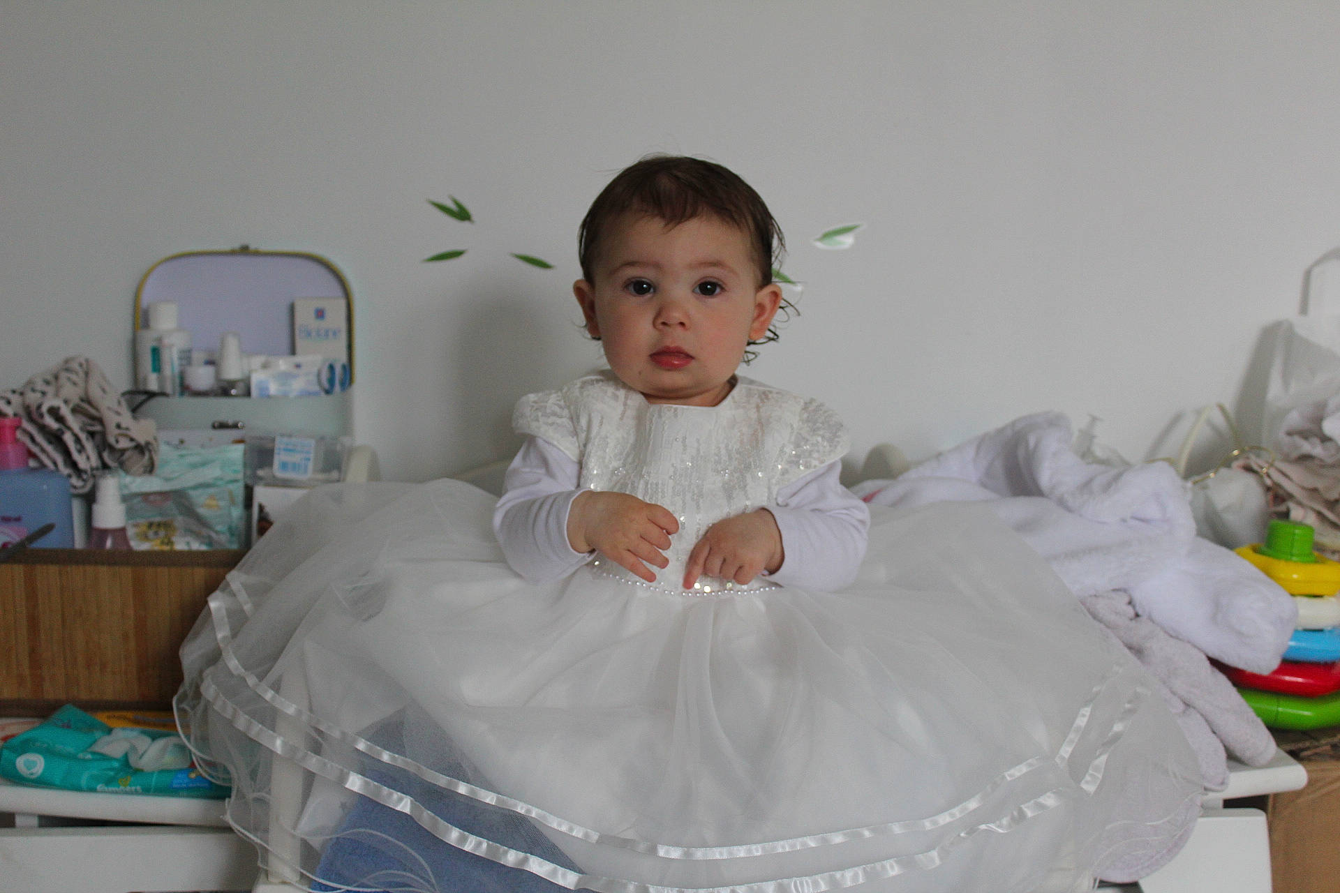 Emmy participe au concours pour gagner de l'argent avec cette photo : baby, baby_products, baby_toddler_clothing, bridal_accessory, child, comfort, costume, embellishment, event, fashion_accessory, fashion_design, formal_wear, fun, happy, iris, linens, person, room, sitting, sleeve