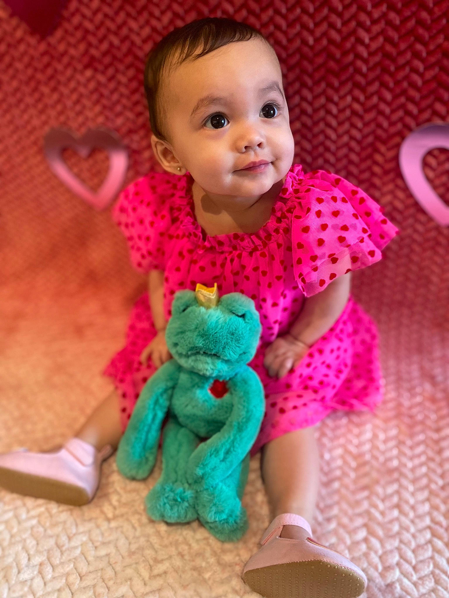 Ivy is registered to the contest to win money with this photo: baby, baby_toddler_clothing, cheek, doll, dress, fashion_accessory, fawn, flooring, magenta, pattern, person, pink, product, skin, sleeve, stuffed_toy, textile, toddler, toy, wool