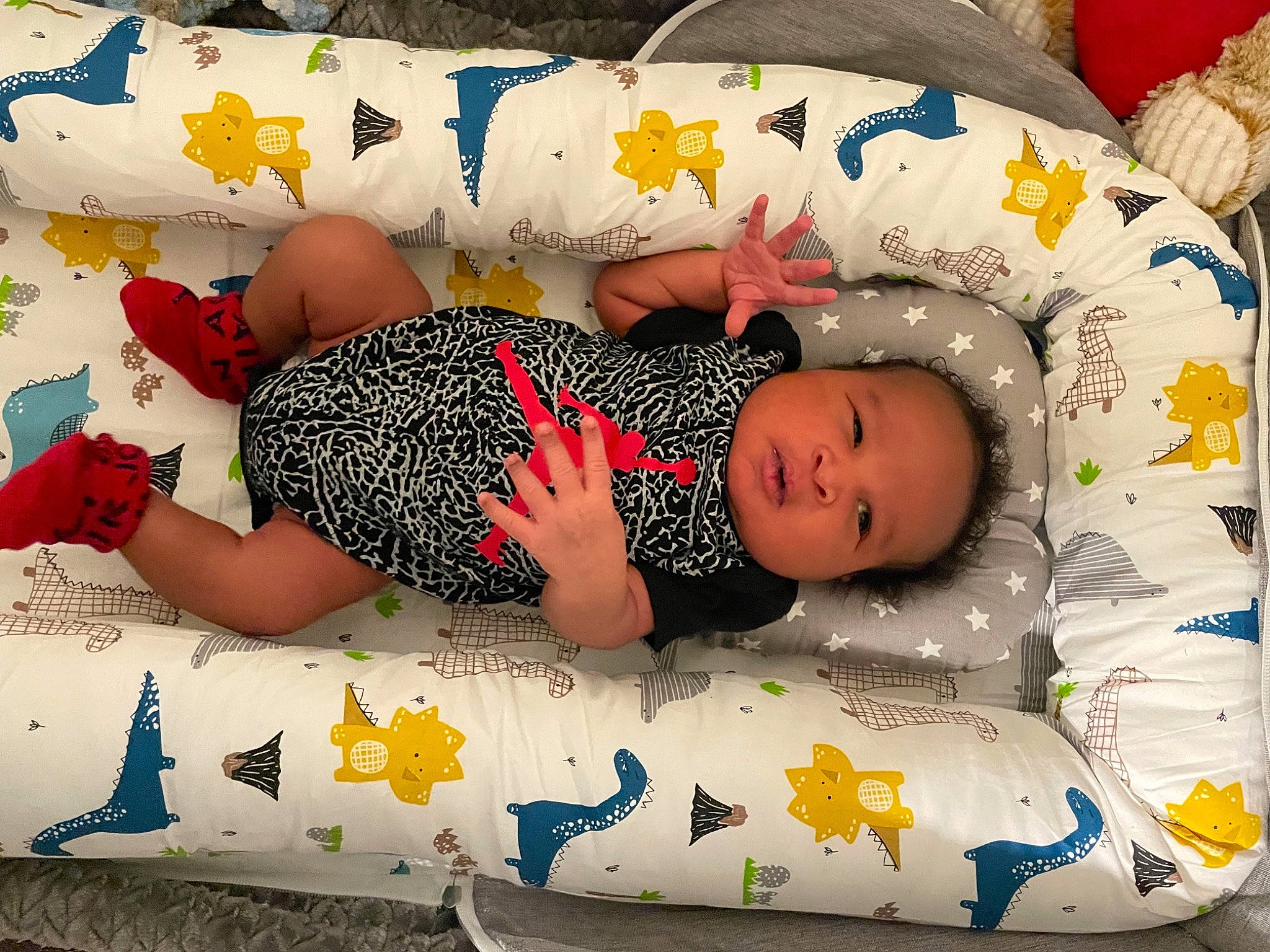 Nathan is registered to the contest to win money with this photo: art, baby, baby_products, baby_sleeping, baby_toddler_clothing, bed, bed_sheet, bedding, bedtime, child, comfort, facial_expression, fun, leisure, linens, pattern, person, textile, thigh, toddler