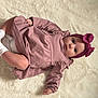 Léane participe au concours pour gagner de l'argent avec cette photo : baby, infant, child, pink_dress, headband, bow, lying_down, carpet, fluffy_rug, cute, portrait, soft_texture, indoors, small_hands, small_feet, white_socks, curious_expression, baby_fashion, closeup, adorable