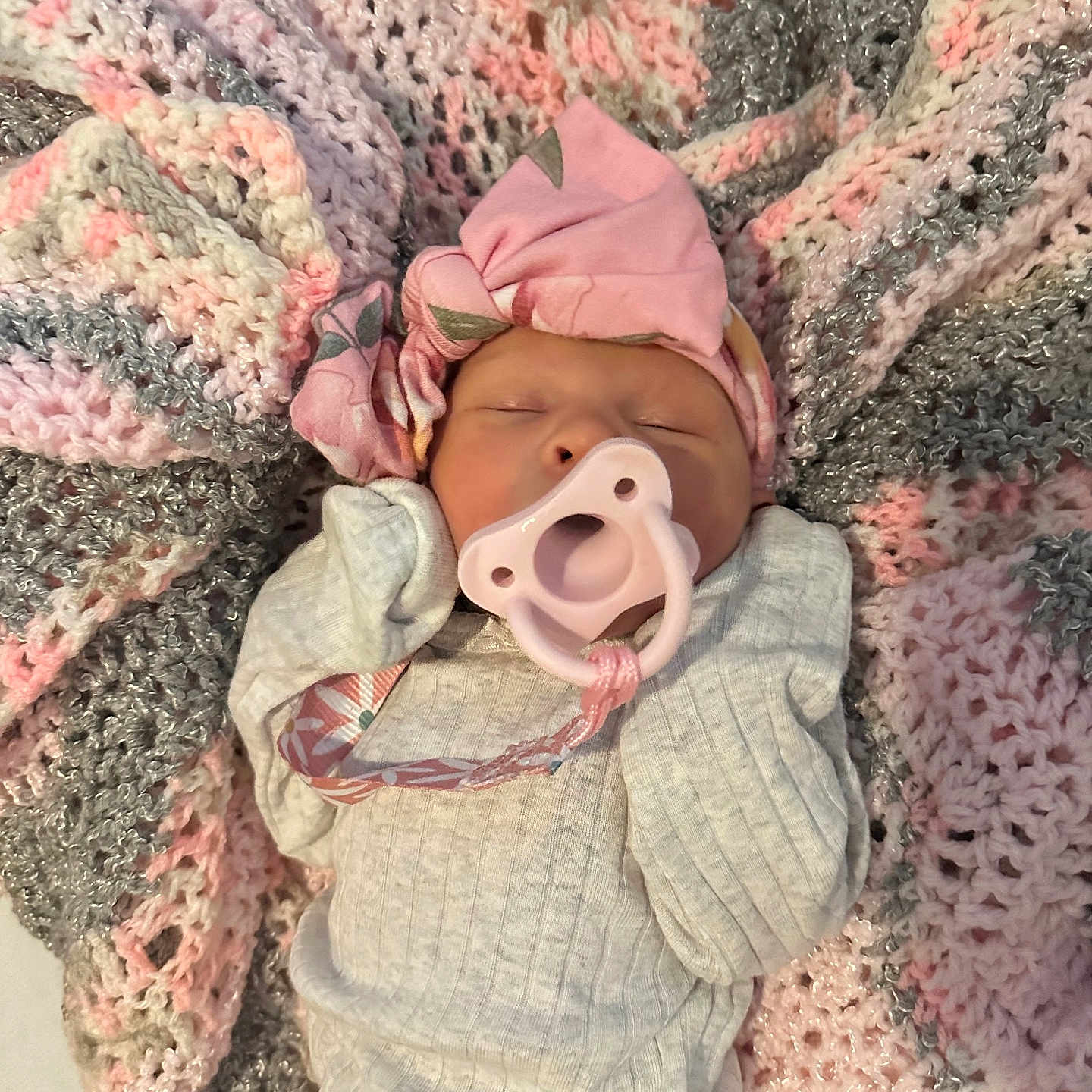 Roxanne Scoggins joined the competition — help win amazing prizes! baby, blanket, clothing, cozy, cute, gray, headwrap, indoors, infant, knit, lying_down, newborn, pacifier, peaceful, pink, sleeping, small, soft, white, wrapped