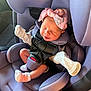 newborn, baby, car_seat, purple, pink_bow, headband, socks, sleeping, infant, child, baby_clothes, seatbelt, safety, cute, tiny, peaceful, indoors, car, portrait, resting