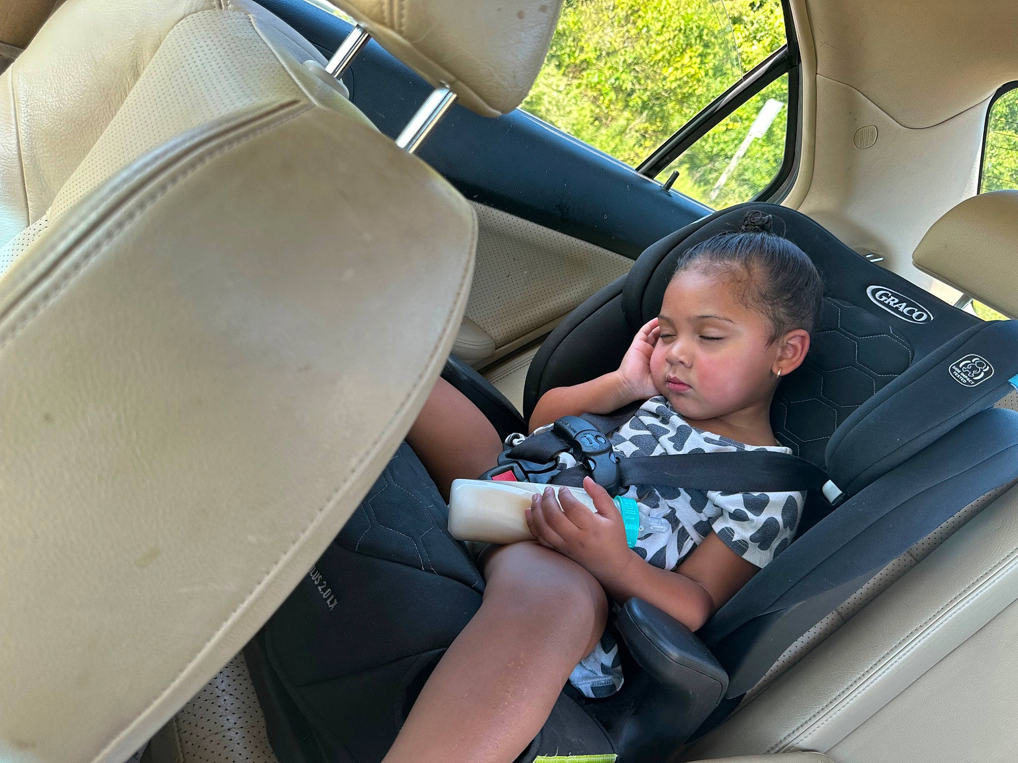 Jaylani joined the competition — help win amazing prizes! auto_part, automotive_design, automotive_exterior, car, car_seat, car_seat_cover, comfort, family_car, head_restraint, leisure, mode_of_transport, motor_vehicle, person, seat_belt, shorts, toddler, travel, tree, vehicle, vehicle_door