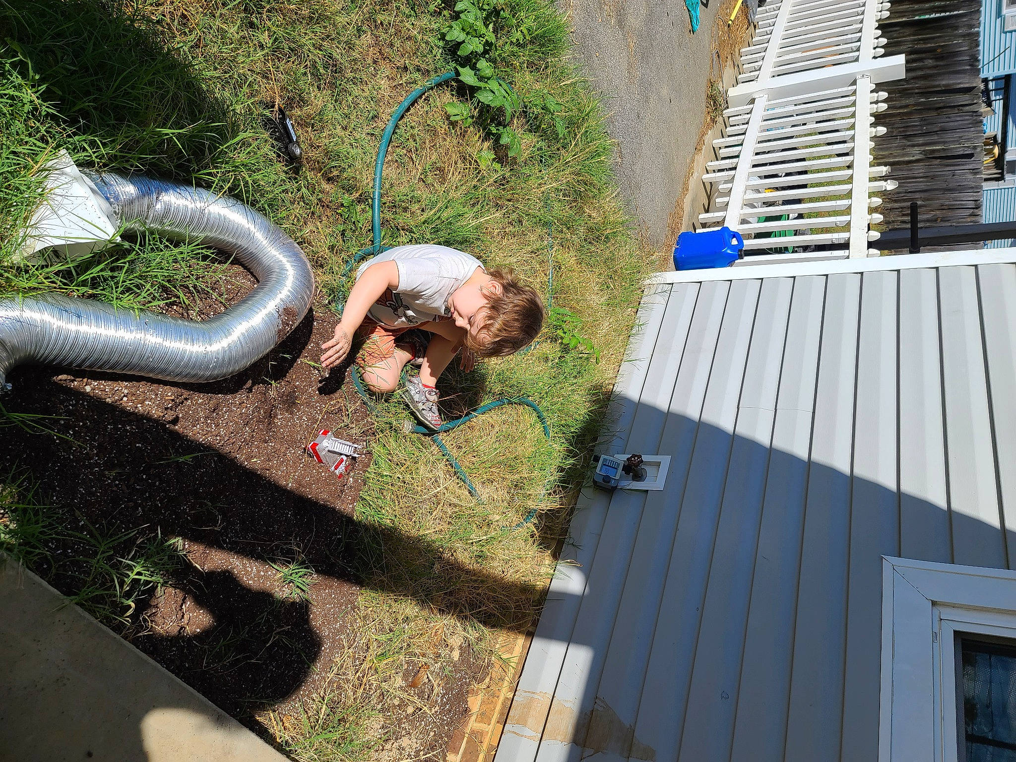 Malachi joined the competition — help win amazing prizes! backyard, concrete, flooring, fun, garden, grass, landscape, leisure, people_in_nature, person, plant, recreation, roof, shadow, slope, soil, tree, wood, yard