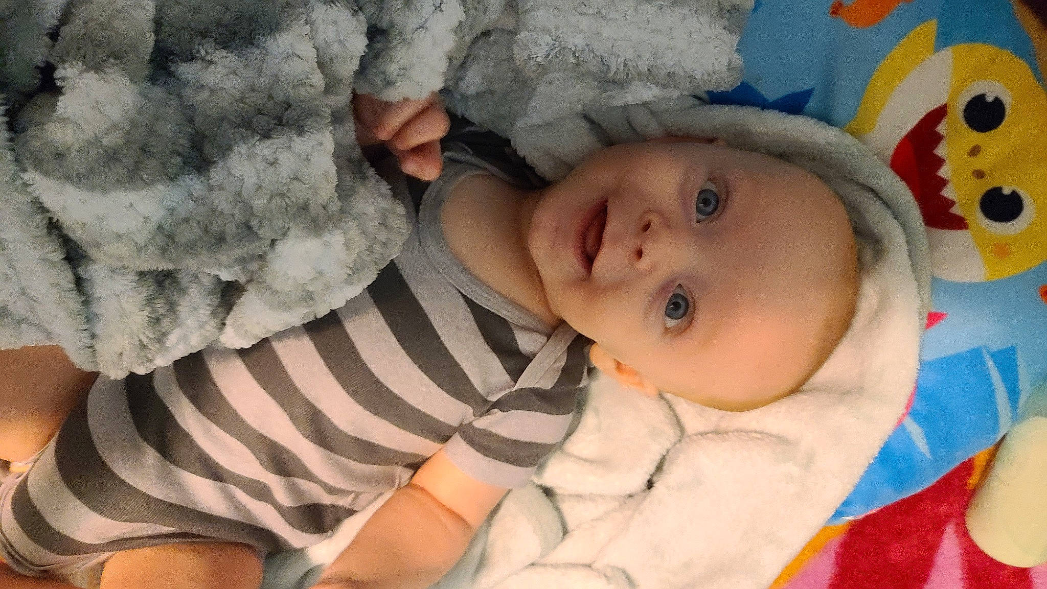 Declan joined the competition — help win amazing prizes! baby, baby_toddler_clothing, cheek, child, chin, comfort, eye, face, happy, head, human, iris, linens, mammal, nose, person, room, skin, sleeve, textile