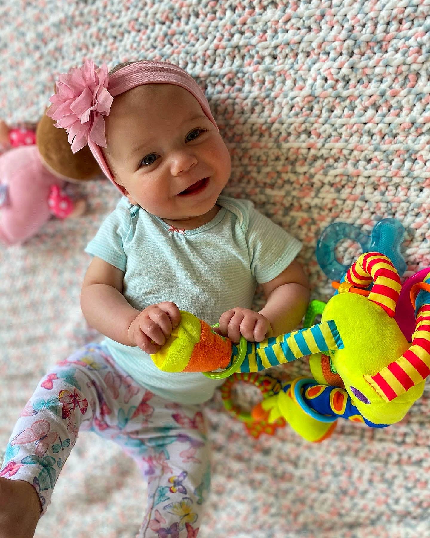 Kinsley-jo joined the competition — help win amazing prizes! baby, baby_playing_with_toys, baby_products, baby_toddler_clothing, cheek, child, face, facial_expression, finger, fun, happy, headwear, pattern, person, pink, skin, sleeve, smile, t_shirt, textile