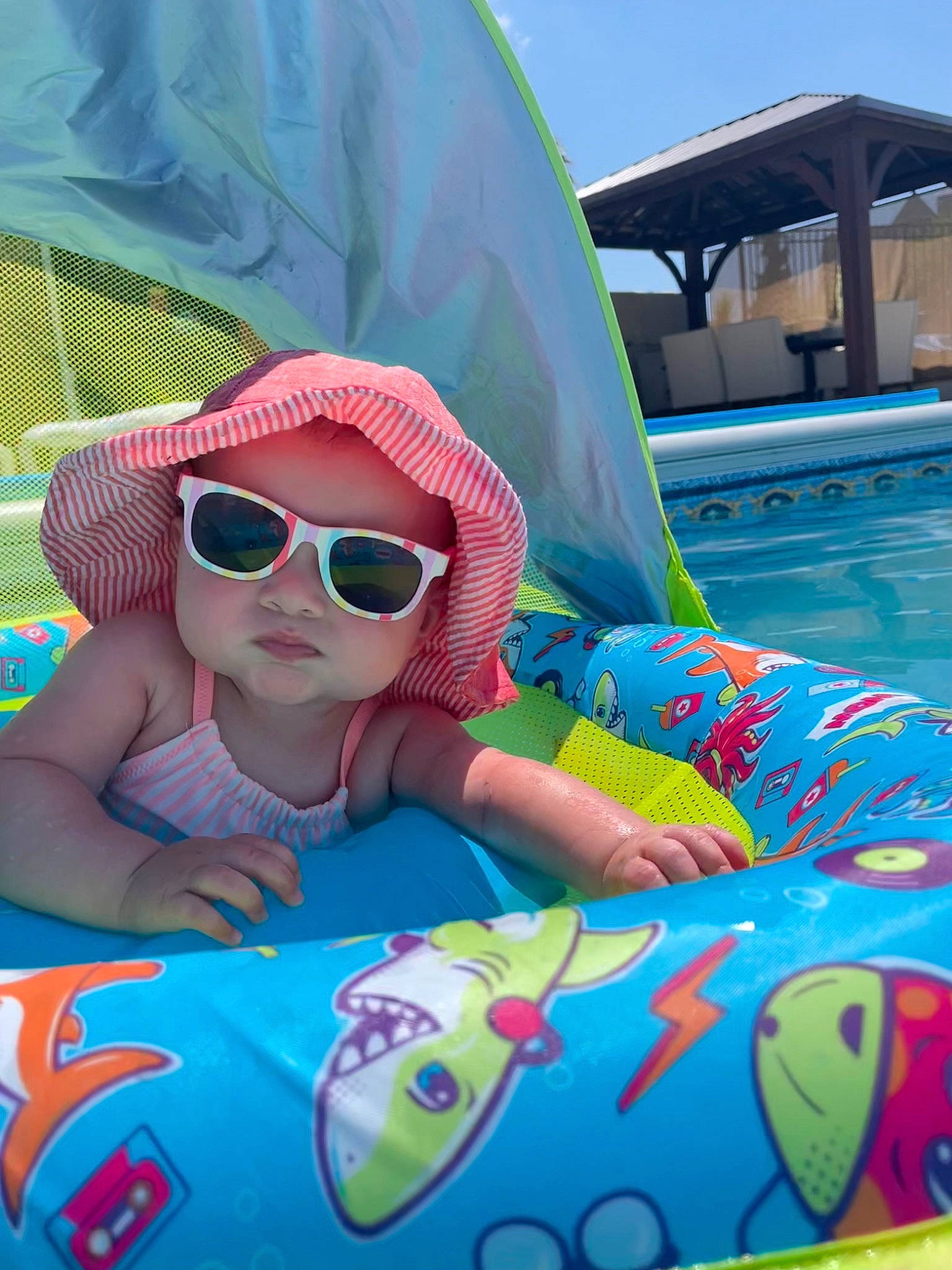 Murphy joined the competition — help win amazing prizes! aqua, azure, cool, eyewear, fun, glasses, goggles, grass, happy, hat, headwear, leisure, mouth, person, pink, recreation, sky, summer, sunglasses, toddler