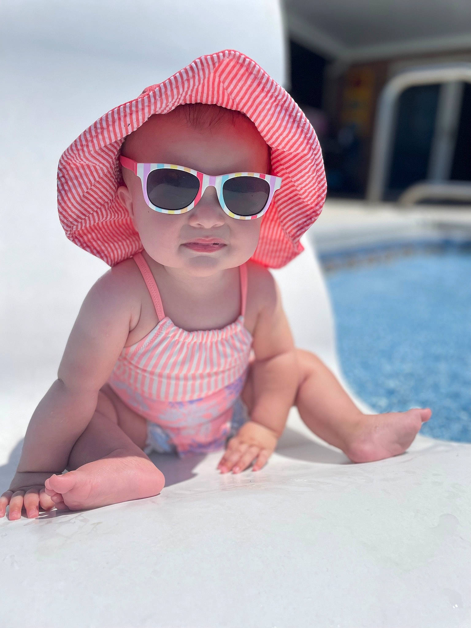 Murphy is registered to the contest to win money with this photo: baby, baby_toddler_clothing, cap, cool, eyewear, fun, glasses, goggles, happy, hat, lip, mouth, person, personal_protective_equipment, pink, skin, summer, sun_hat, sunglasses, toddler